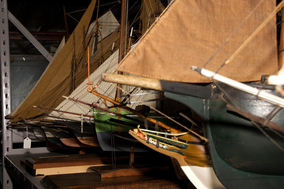 Photographs of ship models in collections storage.