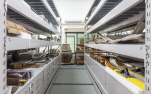 View of Museum objects on shelves in collections storage.